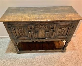 $450 - Jacobian two door carved wood cabinet with bottom shelf.  30"H x 40"W x 15.5"D