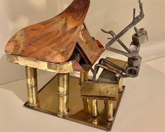 $95 - Metal sculpture. Piano player made of nuts and bolts 9 1/4" H x 6" W x 12" D - not signed