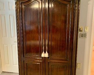 $550 - Century two door carved wood armoire.  86"H x 51"W x 22"D