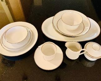 $260 Set - 64 pieces - complete service for 11 plus serving pieces and misc pcs. Winterling Bavaria "Platinum Symphony" china. 11 dinner plates (10"D); 12 salad plates (7.5"D); 11 bread plates (6.5"D), 12 soup bowls (8.75"D); 12 cups (3"H) and 12 saucers (6"D); 12 finger bowls (5"D);  gravy boat (3.5"H x 6.5"D); 2 serving bowls (2.5"H x 9"D); one oval serving platter (15"L x 9.25"W); one creamer (3.5"H x 4.5"D) and one sugar bowl (3.5"H x 4"D).