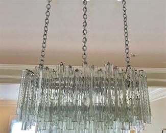 FIRM PRICE - $2,500 - FIRM PRICE - FIRM PRICE Oval, vintage Venini style Murano glass chandelier with Triedri prisms - 41" H (at maximum extension), 30" W x 20" D. Height without chains is 16"