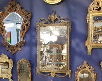 A collection of small antique mirrors 