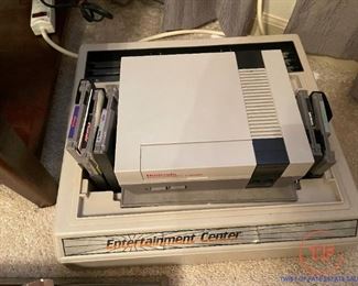 Vintage Nintendo Game Console with Game Cartridges