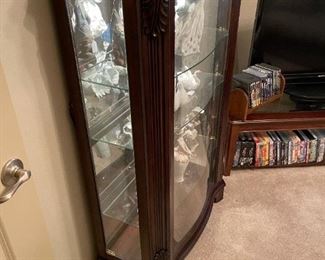 Lighted Curio Display Cabinet with Carved Accents