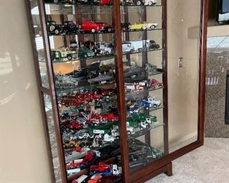 LARGE Collection of Die Cast Collectible Cars, Trucks, and Tractors in LARGE Lighted Sliding Front Display Cabinet / Case