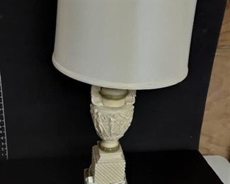 Ivory Colored Table Top Lamp. Has really nice carvings. See pictures