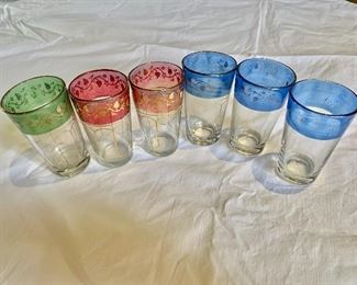 $30 - Set of six Moroccan style tea glasses - three blue and gold rimmed, two red and gold rimmed  and one green and gold rimmed. 4"H x 2.25"D