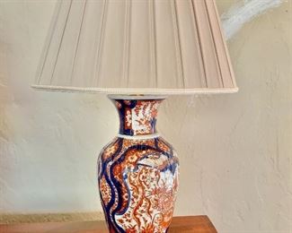 $595  - Fine Imari porcelain table lamp with hand made silk box pleat shade. Tested and working. 29.5"H x 18"D
