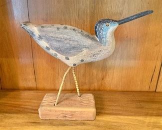 $40 - Carved wooden bird on stand.  10"H x 11"L x 3"D