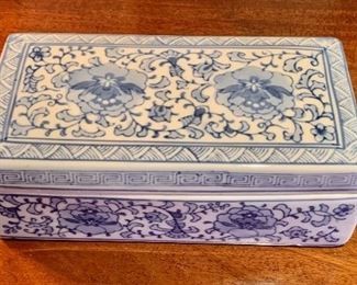 $60 - Blue and white ceramic lidded trinket box. 2.75"H x 7.5"W x 4.75"D