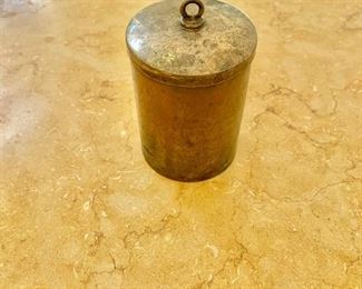 $15 - Lidded metal storage tin. 4.25"H x 2.5"D