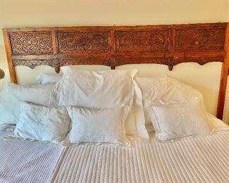 $495 - Intricately carved panel headboard; 61"H x 86.5"W (Queen)