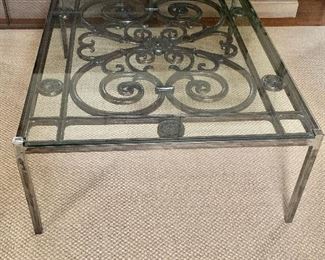 $995; One of a kind glass topped coffee table hand crafted with an antique iron gate.  37” W x 48” L x 17” H