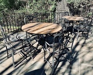 Amazing heavy wrought iron patio tables - 2 available;  table with limestone top 48" D