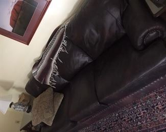 Leather couch, 8’ very nice condition. 