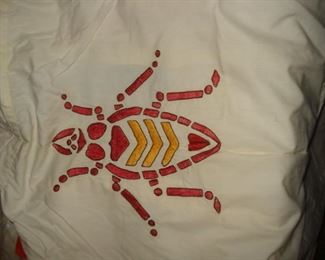 the back of the cootie shirt