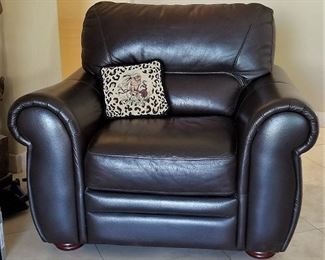 Matching black leather side chair that goes with the sofa loveseat.