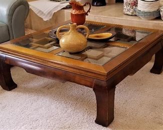 Wooden and glass coffee table with curved legs