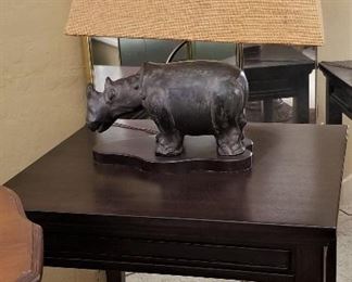 Square wooden table and unusual hippopotamus lamp 