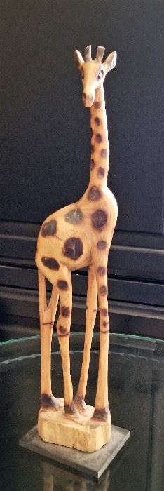 Wooden giraffe sculpture