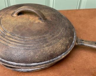 $25.00.................Cast Iron Pan and Lid (H429)