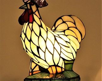 Cute Tiffany styled stained glass like rooster lamp is beautiful.