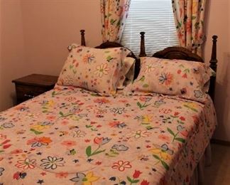 Queen size bedding set with matching comforter and draperies.