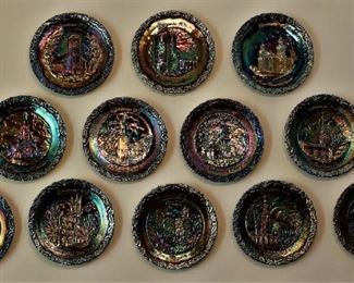 Fenton /Large collection of carnival glass Christmas plates each with a different church.