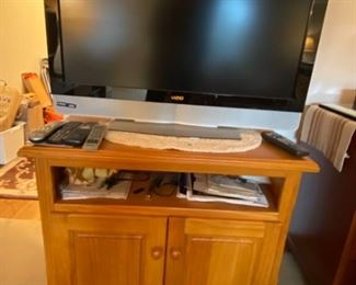 129 Visio TV, Sharp VHS Player and TV Stand
