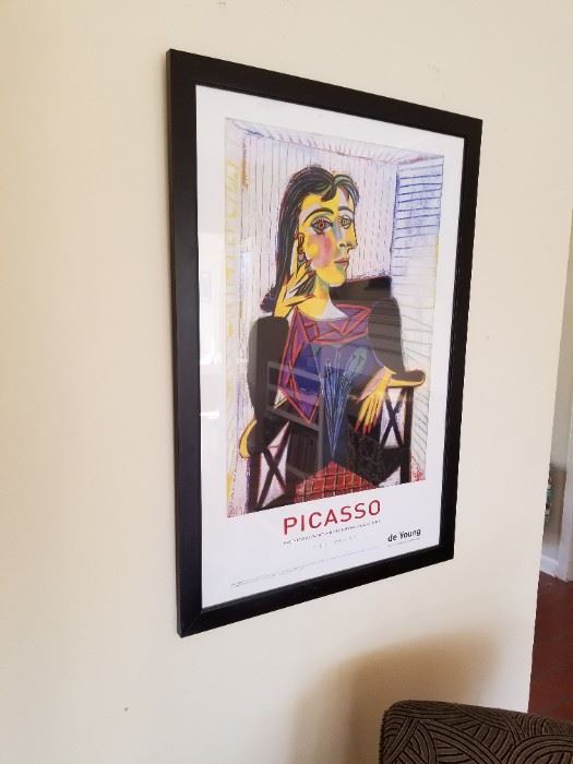 Picasso print is one of many art items.