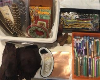 Fur, feathers, beads, cigar boxes