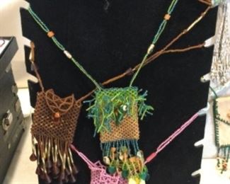 Beaded one of a kind pouches by artist