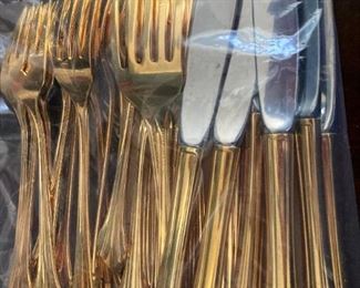 32 pieces of Oneida gold toned flatware