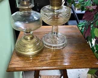 Oil lamps; antique table
