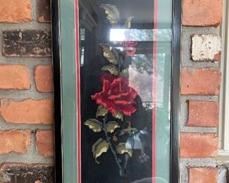 . . . there are many piece of art throughout the home -- this happens to be a needle point piece