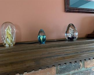 . . . three of about 5-6 paperweights