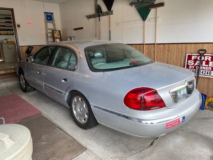 . . . 1999 Lincoln Continental with only 80,000 miles and in excellent condition!! Yes -- driven by a little old lady.