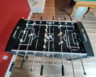 Brand - Sportcraft - Melbourne Foosball Table Features and Parts:
•	Full size foosball table
•	Steel foosball rods
•	Three-man goalie rod
•	Convenient side ball return
•	Bead style scoring on both ends of the table
•	Includes sanded foosball balls

Sportcraft - Melbourne Foosball Table Specs and Dimensions:
•	Length: 56 inches in length
•	Width: 29.4 inches in width
•	Height: 34.75 inches tall
•	Weight: 114 pounds
