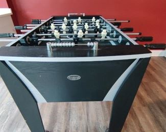 Brand - Sportcraft - Melbourne Foosball Table Features and Parts:
•	Full size foosball table
•	Steel foosball rods
•	Three-man goalie rod
•	Convenient side ball return
•	Bead style scoring on both ends of the table
•	Includes sanded foosball balls

Sportcraft - Melbourne Foosball Table Specs and Dimensions:

•	Length: 56 inches in length
•	Width: 29.4 inches in width
•	Height: 34.75 inches tall
•	Weight: 114 pounds
