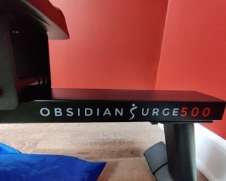 Brand - Obsidian Surge 500 Water Rowing Machine
WATER PERFORMANCE
Row on the water in the comfort of your home. The water creates a smooth and steady rowing experience with every stroke. Instant resistance is available with the flywheel and 16 fan blades. The faster the fan blades spin the higher resistance and dynamic response caused by the harmonious interaction with the water, giving the user a unique experience.

FITNESS TECHNOLOGY
The Fitness Meter is designed to accurately track all essential workout metrics i.e. Total Time, Time/500M, SPM, Total Strokes, Calories, HR, Ambient Temperature, and more. The Fitness Meter allows the user to tailor a personalized workout or use the built preprogrammed features. Compatible with ANT+ heart rate technology, like heart rate belts or watches, so you can measure an accurate pulse and monitor the effectiveness of your workout. When worn around your chest during your exercise routine, the pulse belt will transmit your heart rate to the advance