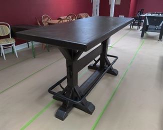 BAR HEIGHT STAND-UP BREW PUB TABLE WITH METAL FOOTREST & TRESTLE BASE Newly purchased from NFM for $1000 2 months ago.     
(OUR PRICE MUCH BETTER) - $500