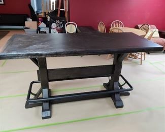 BAR HEIGHT STAND-UP BREW PUB TABLE WITH METAL FOOTREST & TRESTLE BASE Newly purchased from NFM for $1000 2 months ago.     
(OUR PRICE MUCH BETTER) - $500