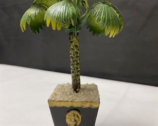 Tree candlesticks set in classical planter style bases with lion head ring handles, white stones, and ball feet.  Unknown origin