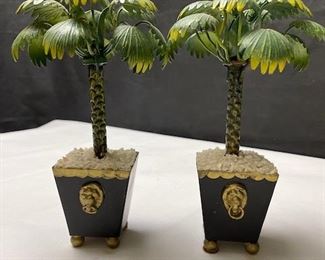 Tree candlesticks set in classical planter style bases with lion head ring handles, white stones, and ball feet.  Unknown origin
