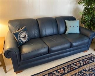 $350 lazy boy navy blue leather sofa bed in good condition except a couple of small damages on side pillows, not showing. 