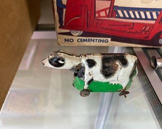 Small Early Toy Cow on Wheels