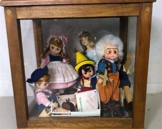 Lot of 6 Dolls in Wooden and Glass Doll Case - Madame Alexander Dolls Storyland Collection and other Dolls 12 x 9 x 12 Inches Location