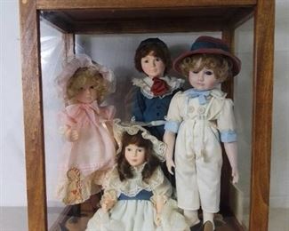 Lot of 4 Jan Hagara Collectible Dolls by Effanbee and a Vintage Porcelain Doll in Wooden and Glass Display Case