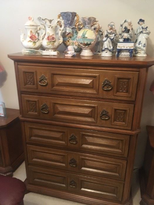 . . . a chest of drawers -- part of a four-piece bedroom set.