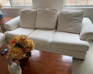 Upholstered couch and love seat